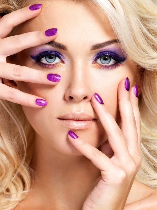 beautiful-blond-woman-with-beauty-purple-manicure-makeup-eyes-fashion-model-with-curly-hairstyle (1)